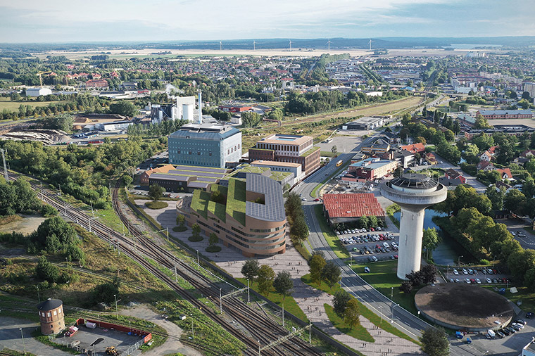 Bildmontage &ouml;ver Kristianstads kommuns f&ouml;rslag f&ouml;r h&ouml;gskolans placering p&aring; Lokstallstomten. Illustration: Arkitekterna Krook & Tj&auml;der Uulas